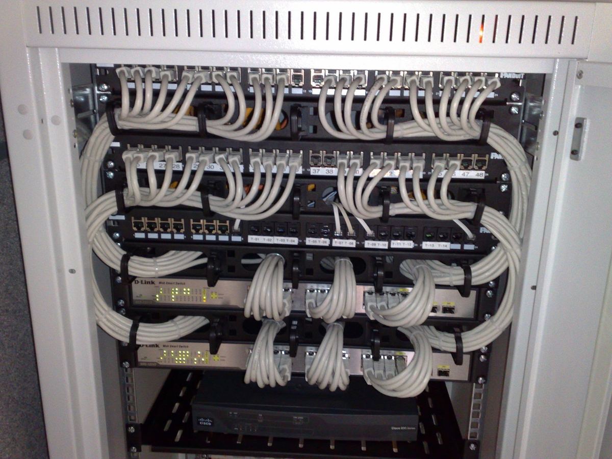 Network switches and patch panels in a server rack.