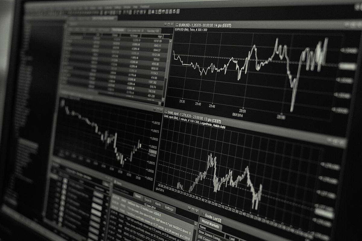 A monitor showing data charts.
